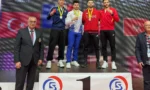 Bursa Büyükşehir Belediyesporlu Enes Sad Beşbadem Balkan Karate Şampiyonası'nda bronz madalya kazanırken