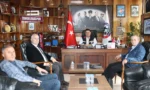 Işık Kansu ve Prof. Dr. Hasan Haluk Erdem, GMİS'i ziyaret ederek Köy Enstitüleri konulu panel hakkında görüştü.