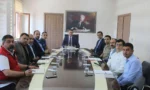 Selim Kaymakamlığı'nda 15 Temmuz etkinlikleri için değerlendirme toplantısı yapılıyor.