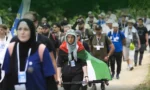 Bosna Hersek'te Srebrenitsa soykırımını anmak için düzenlenen Barış Yürüyüşü katılımcıları