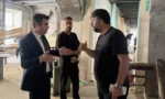 Susuz Kaymakamı Furkan Öztürk, Yeni Hükümet Konağı'nın restorasyon çalışmalarını inceliyor.