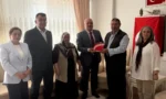 AK Parti İl Başkanı Muammer Sancar, 15 Temmuz şehidi Hacı Halil Polat'ın ailesini ziyaret ediyor.